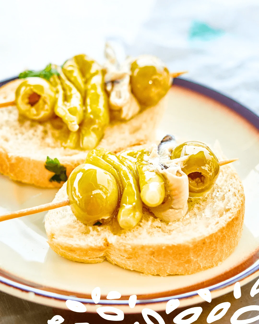 Assiette de Gildas : guindillas, olives et anchois sur pain