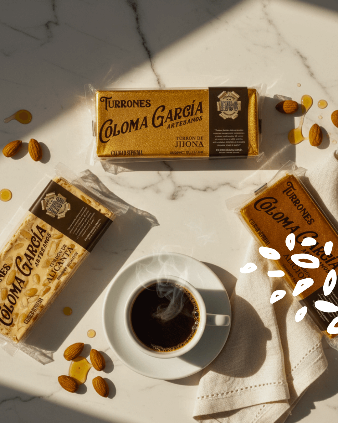 Coffret automnal de turrons Coloma García avec café et éléments naturels