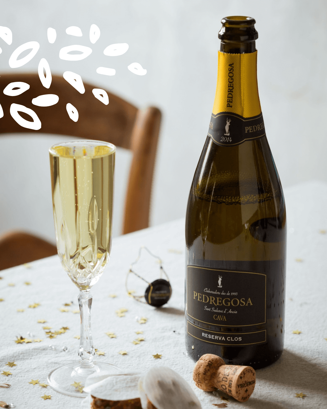 Bouteille de cava bio Pedregosa Reserva Clos avec flûte de dégustation.