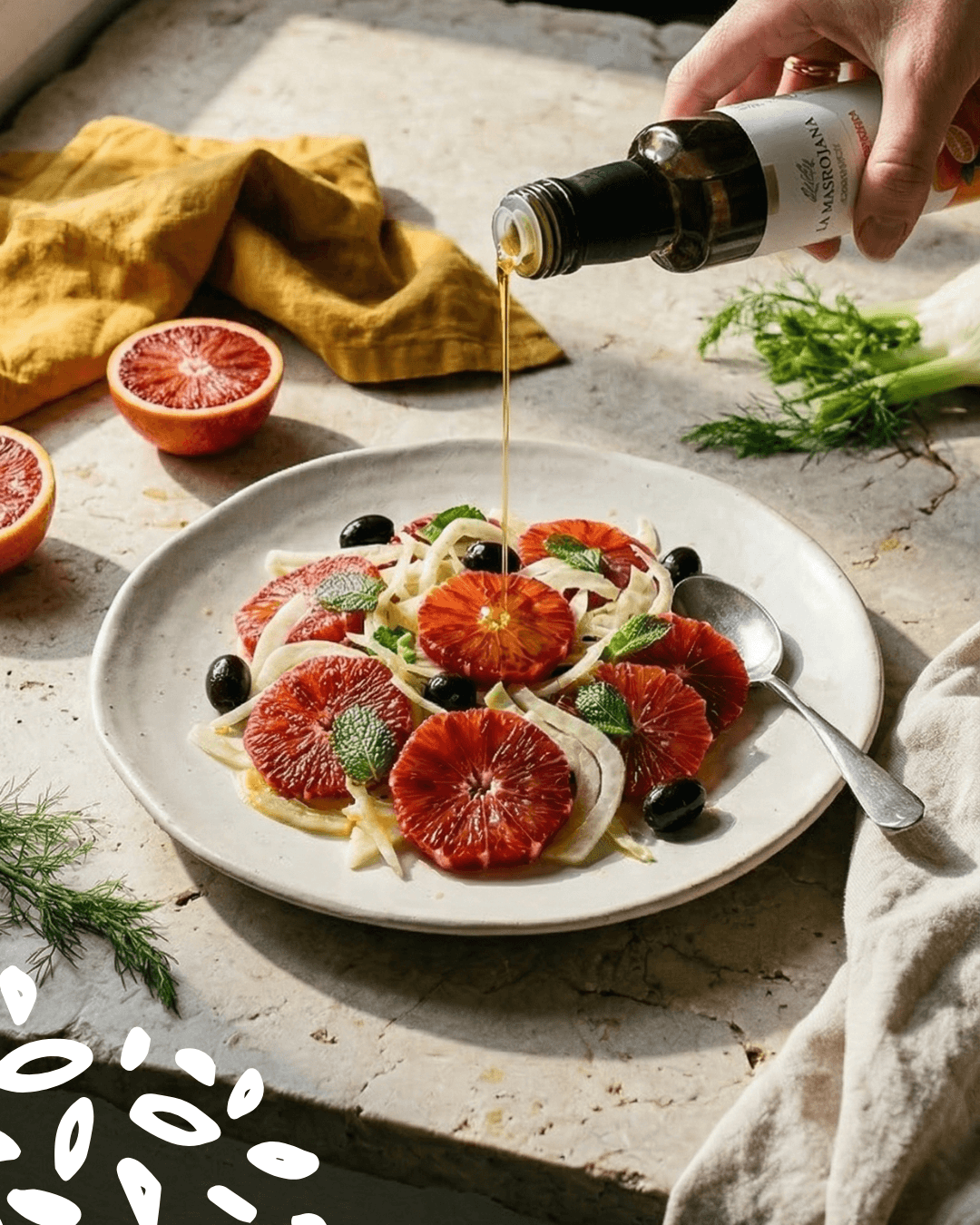 huile d’olive citron versée sur salade agrumes cuisine méditerranéenne